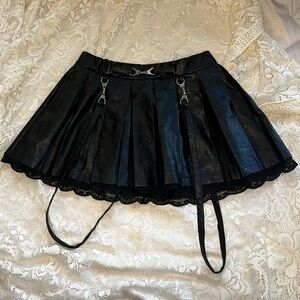 Black faux leather pleated mini skirt